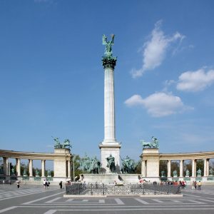 The statue of Archangel Gabriel in Heroes' Square, Budapest, Hungary. Architect Albert Schieckedanz created the square for 1896 Hungarian millennium celebrations.  At the base of Gabriel's column is Arpad and the chieftains of the seven Magyar tribes who followed him. Behind the pillar the Millennium Memorial contains staues of the kings and heroes from Hungarian history.