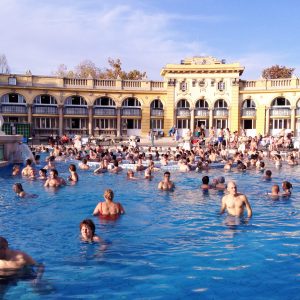 Budapest, Hungary - October 27, 2013: Bathers at the Szechenyi Thermal Baths, Budapest, Hungary. Taken in October on a sunny day.
